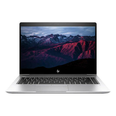 HP laptop with a mountainous landscape on the screen against a white background