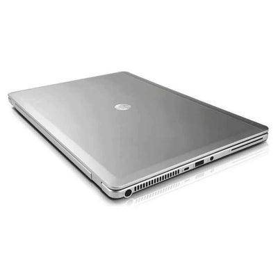 Closed HP EliteBook Folio 9470m refurbished laptop in silver resting on a flat surface, built for business professionals seeking performance and portability