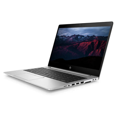 Laptop with a scenic display on a white background