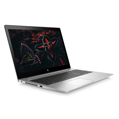 Laptop with a colorful leaf design on the screen against a white background