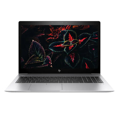 Laptop with a colorful leaf design on the screen against a white background