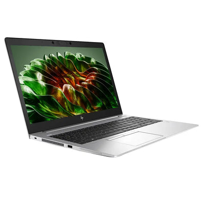 Laptop with a green and orange abstract design on the screen, on a white background