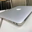 Apple MacBook Air A1466 (2015) in silver, showing side ports and lightweight design, available refurbished for purchase in the UAE.