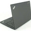 Lenovo ThinkPad X1 Carbon Gen 3 open partially showing keyboard and back of black laptop - Buy Refurbished Laptops UAE, High-Quality Used Laptops