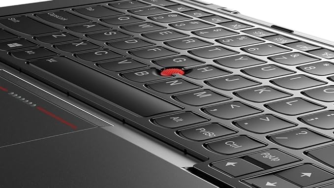 Close-up of Lenovo ThinkPad Yoga 12 keyboard and touchpad in black, refurbished model available in Dubai.